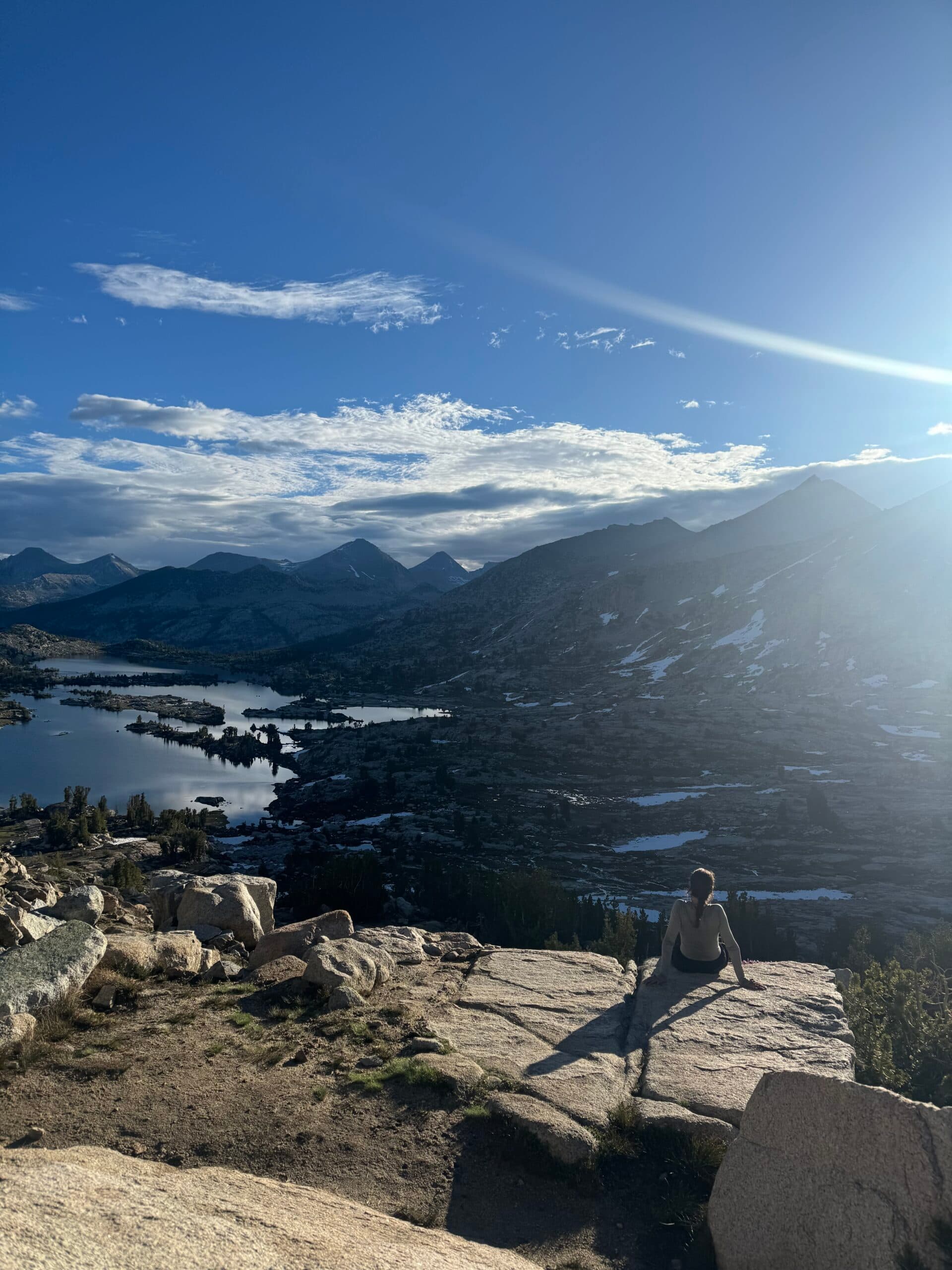 A hiker taking in a quiet overlook along the Pacific Crest Trail